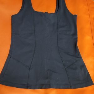 Athleta top with built in support bra in black.